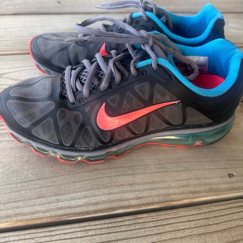 Nike athletic shoes with Red and Blue Highlights